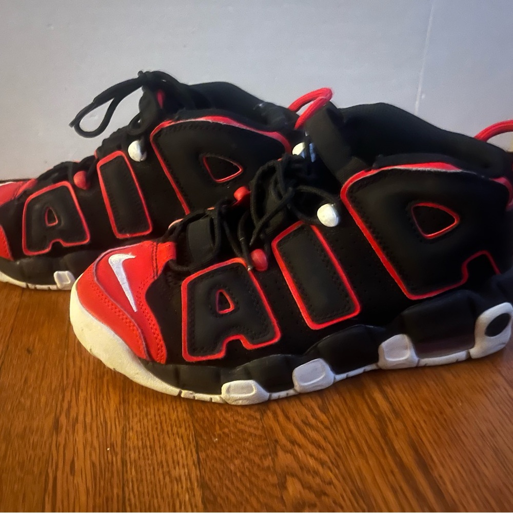 Nike Black and Red Sneakers with Bold Design